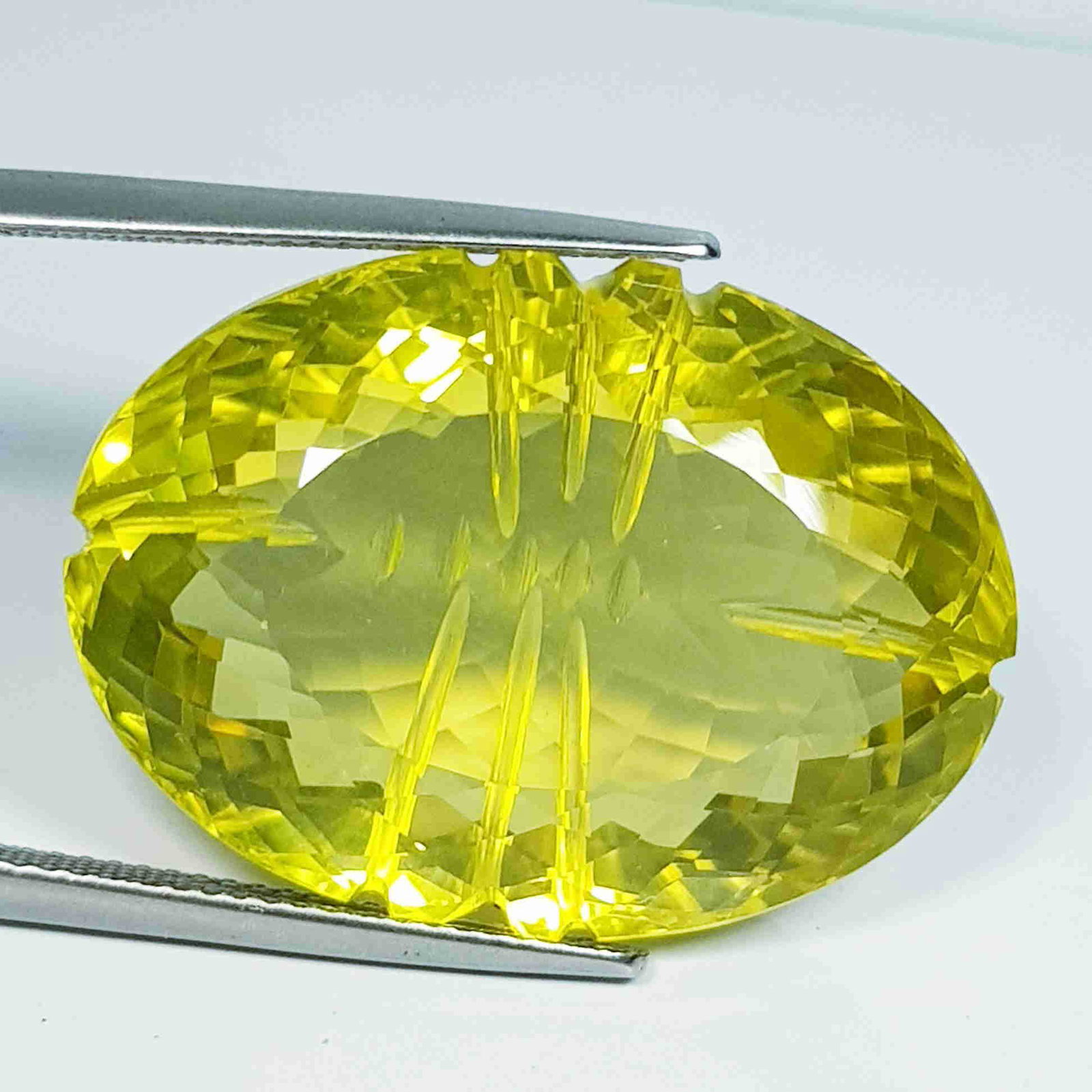 47.53 ct Natural Lemon Quartz Oval Flower Cut: No Reserve! Title: 47.53 ct Natural Lemon Quartz Oval Flower Cut Color/Clarity: VVS Gemstones: Loosegemstone Carat Weights: 47.53 Size/Dimensions: 28.15 x 20.35 x 13.00 Additional Information: Oval / 