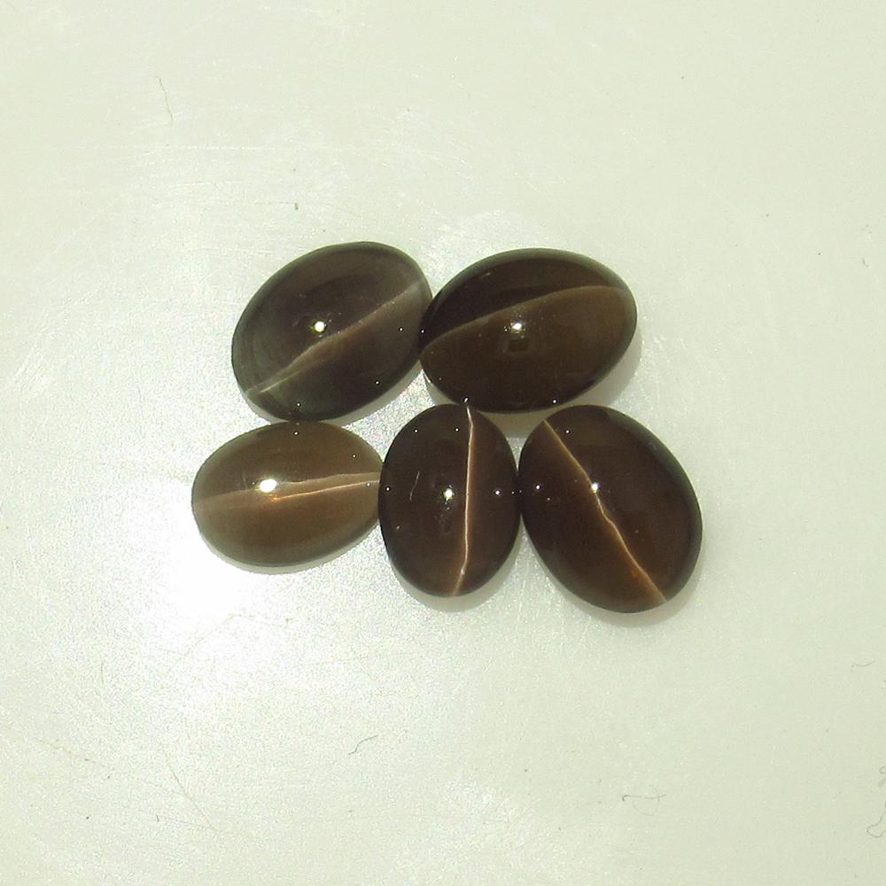 6.00 Ct Natural 5 Sillimanite Catseye Oval Set: No Reserve! Title: 6.00 Ct Natural 5 Sillimanite Catseye Oval Set Stone Clarity:Semi-Transparent Gemstone: Natural Sillimanite Catseye Carat Weight: 6 Size/Dimensions: 7.2x5.3 - 8.2x6.3 mm / 5 PC's Ad