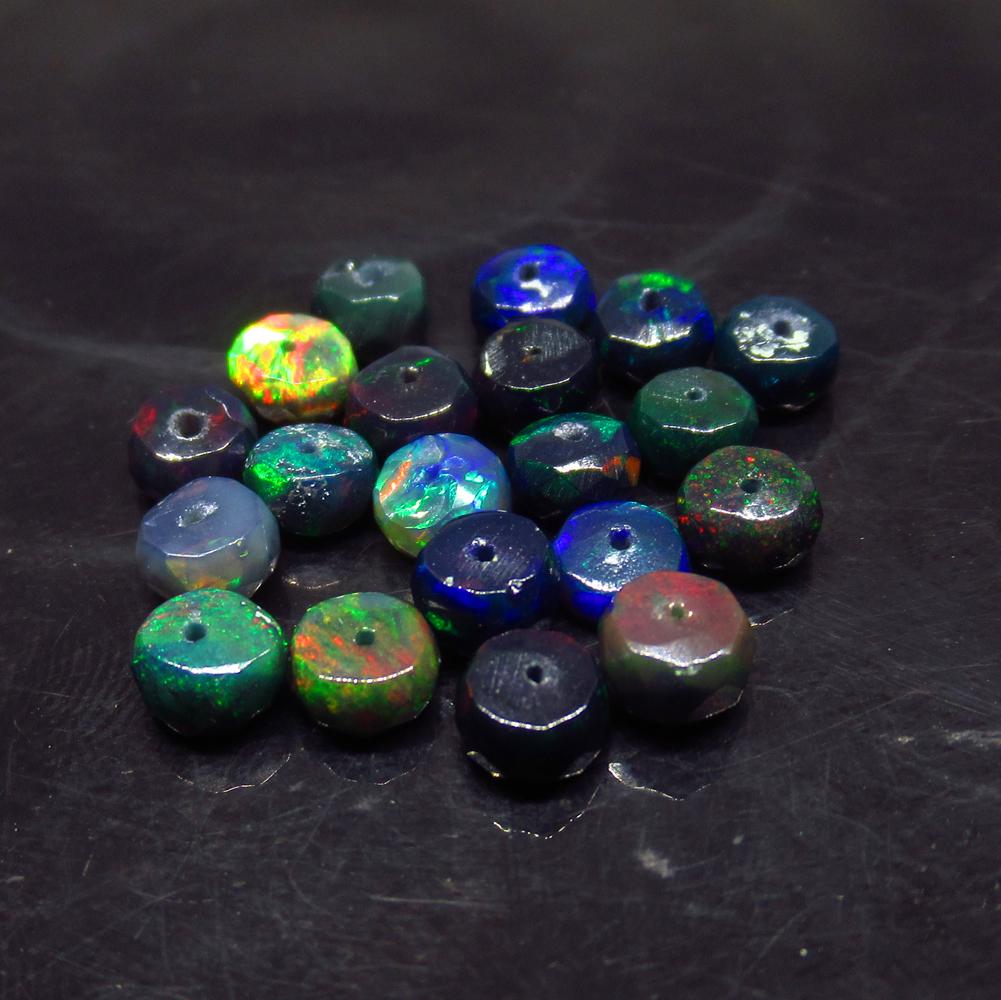 7.33 Ct Natural 20 Drilled Faceted Black Fire Opal: No Reserve! Title: 7.33 Ct Natural 20 Drilled Faceted Black Fire Opal Beads Stone Clarity:Translucent Gemstone: Natural Black Opal Beads Carat Weight: 7.33 Size/Dimensions: 4.80 to 5.10 mm / 20 PC's A
