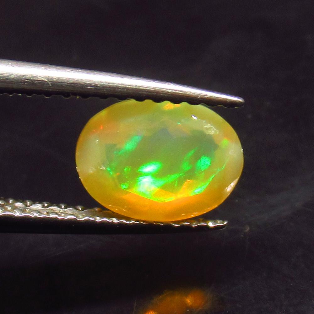 0.84 Ct Natural Ethiopian Multicolor Fire Opal Oval Cut (1 of 3)
