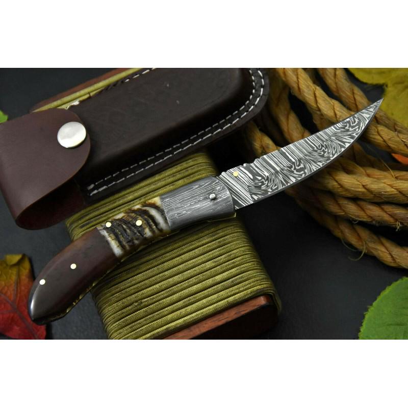 Folding hunting damascus steel knife hiking horn bone: Knife"Columbia"made of damask steel. Handle –camel bone, rams horn and scabbard - genuine leather. Damascus knives are very durable, look great and keep sharpness perfectly. Damascus steel has high