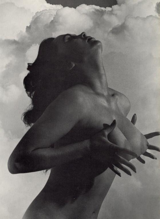 ANDRE DE DIENES - Nude in Clouds: Artist: Andre De Dienes Title: Nude in Clouds Medium: Photo Litho, 1967, USA Dimensions: 7.85x10.75" Description: Heat Wax Mounted on 11x14" Conservation Board Artist Bio: Andre De Dienes was a Hungar