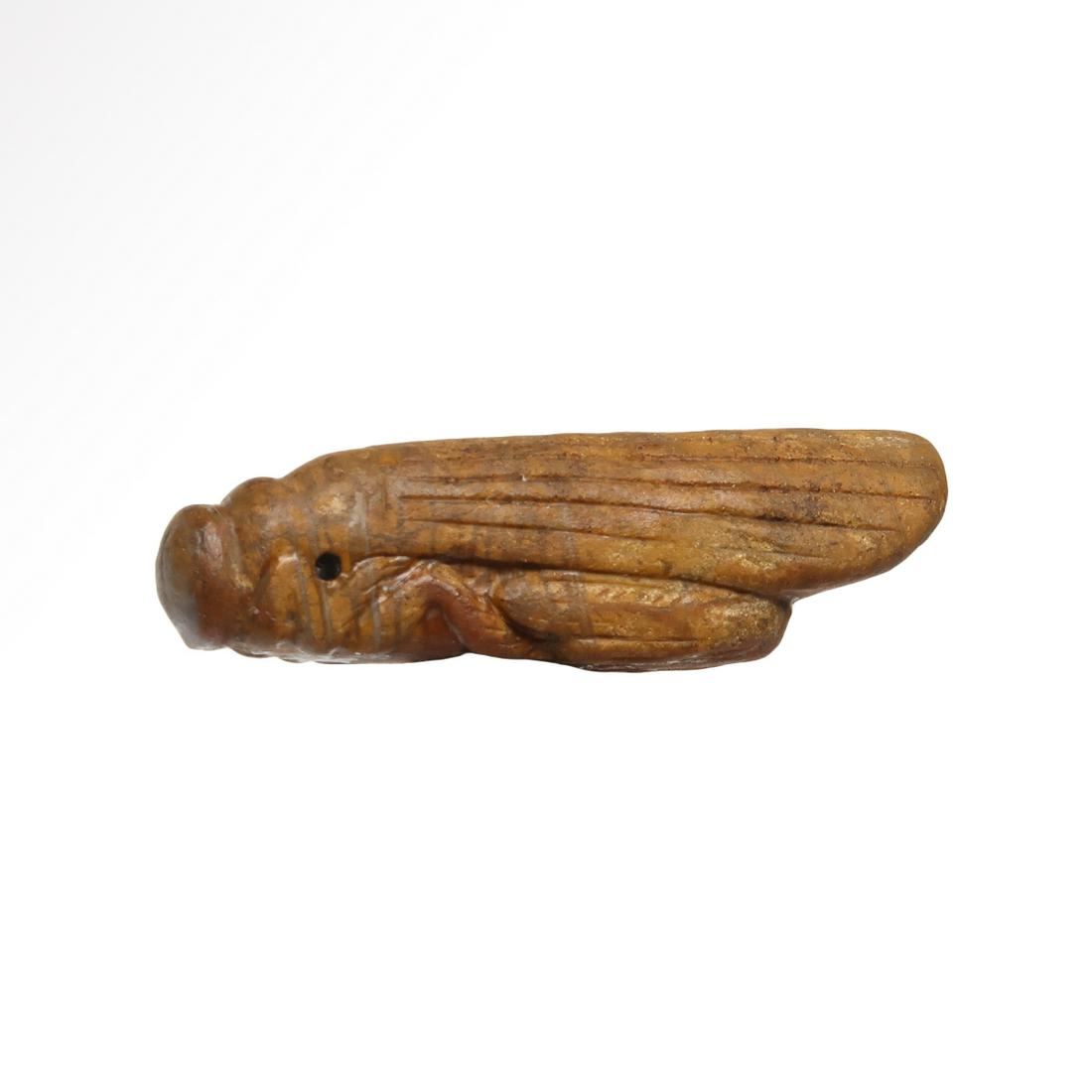 Egyptian Yellow Stone Grasshopper Amulet, Late Period,: Title: Egyptian Yellow Stone Grasshopper Amulet, Late Period, c. 2nd-1st Century B.C. Date/Origin: Egyptian, c. 2nd-1st Century B.C. Dimension: 4.2 cm L - 1 5/8 inc Materials: Stone Provenance: Proven