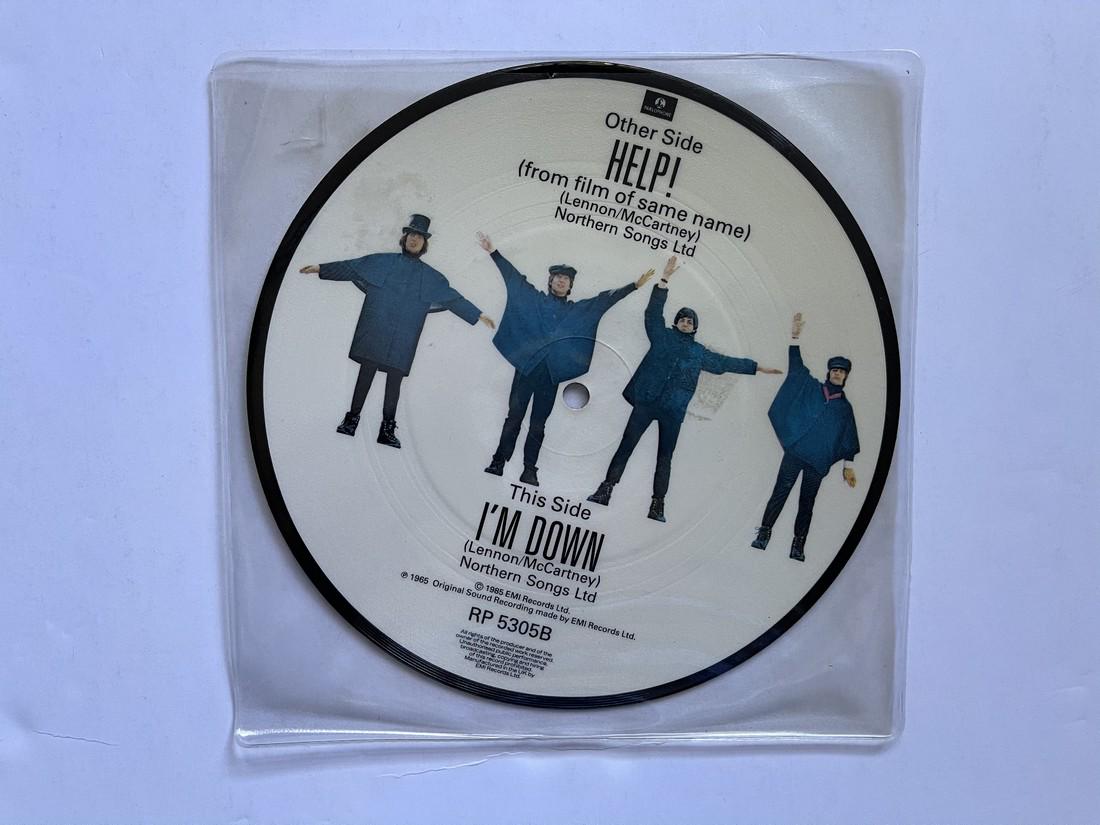 Help! PICTURE DISC: Title: Help! PICTURE DISC Additional Information: The Beatles – Help! / I'm Down PICTURE DISC Reserve: $15.00 Shipping: Domestic: Flat-rate of $10.00 to anywhere within the contiguous U.S. Internati