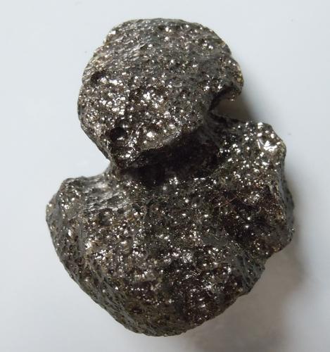 PHILIPPINITE TEKTITE - FROM METEORITE IMPACT: Title: PHILIPPINITE TEKTITE - FROM METEORITE IMPACT Origin: Paracale, Camarines Norte, Luzon, Philippines Size: 3x2.5x1.5 cm / 15 gram extremely glossy sculptural rizalite/philippinite tektite with de