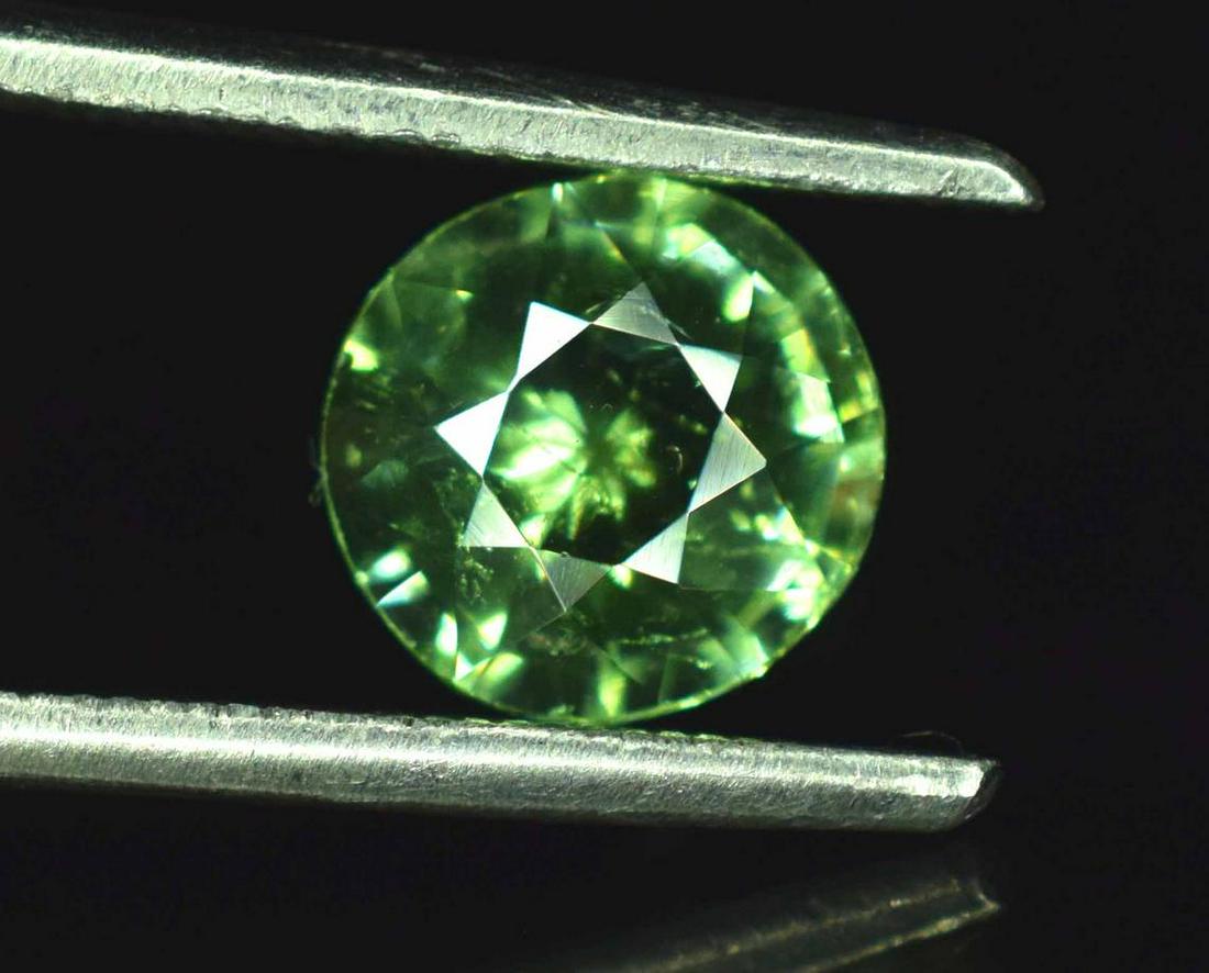 Eye Clean Rare Tsavorite Loose Gemstone - 1.35 Carats: No Reserve! Materials: tsavorite, tsavorite garnet, garnet Carat weight: 1.35 Description 1.35 carats Eye Clean Fresh Green Color Rare Natural Tsavorite Garnet Gemstone From Kenya weight : 1.35 carats