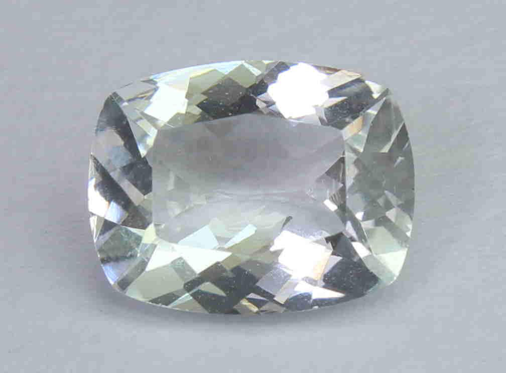 1.61 Cts Natural White beryl: No Reserve! Gemstone : Natural White berylOrigin : BrazilWeight : 1.61 CaratDimensions : 9x7x4 mmShape : Rectangular Cushion CutColor : ColorlessTreatment : No TreatmentTransparency : TransparentClari