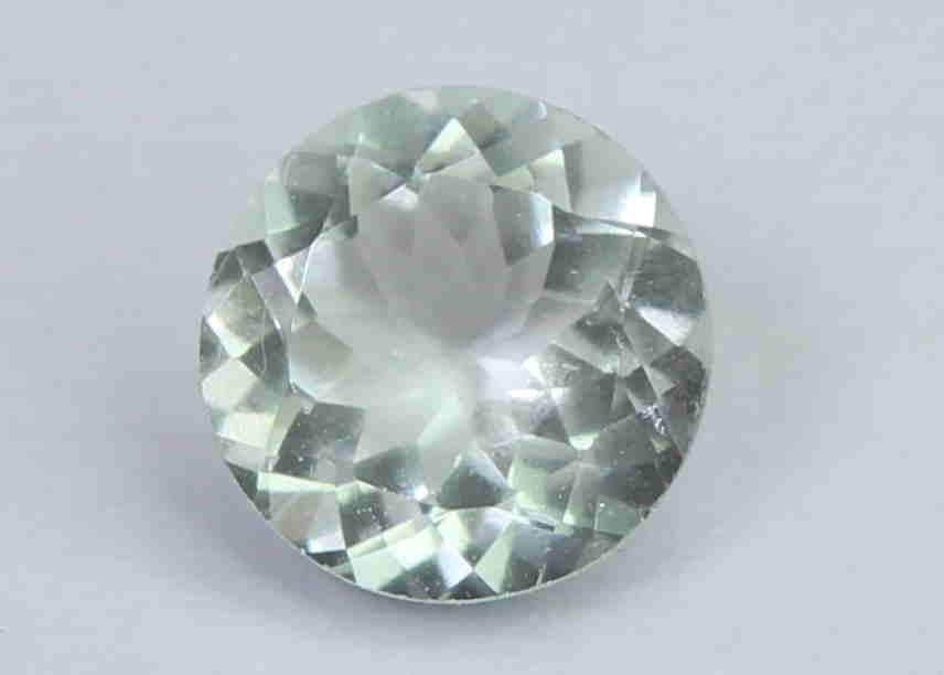 1.09 Ct Natural Green Beryl: No Reserve! Gemstone : Natural Green BerylOrigin : BrazilWeight : 1.08Dimensions : 7-7x3.9 mmShape : Round CutColor : Light GreenTreatment : No TreatmentTransparency : TransparentClarity : No visible 