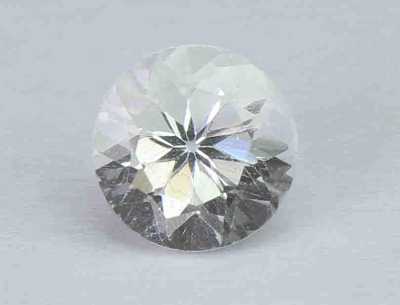1.22 Cts Natural White beryl: No Reserve! Gemstone : Natural White berylOrigin : BrazilWeight : 1.22 caratsDimensions : 6.1-6.1x4.6 mmShape : Round CutColor : ColorlessTreatment : No TreatmentTransparency : TransparentClarity : No
