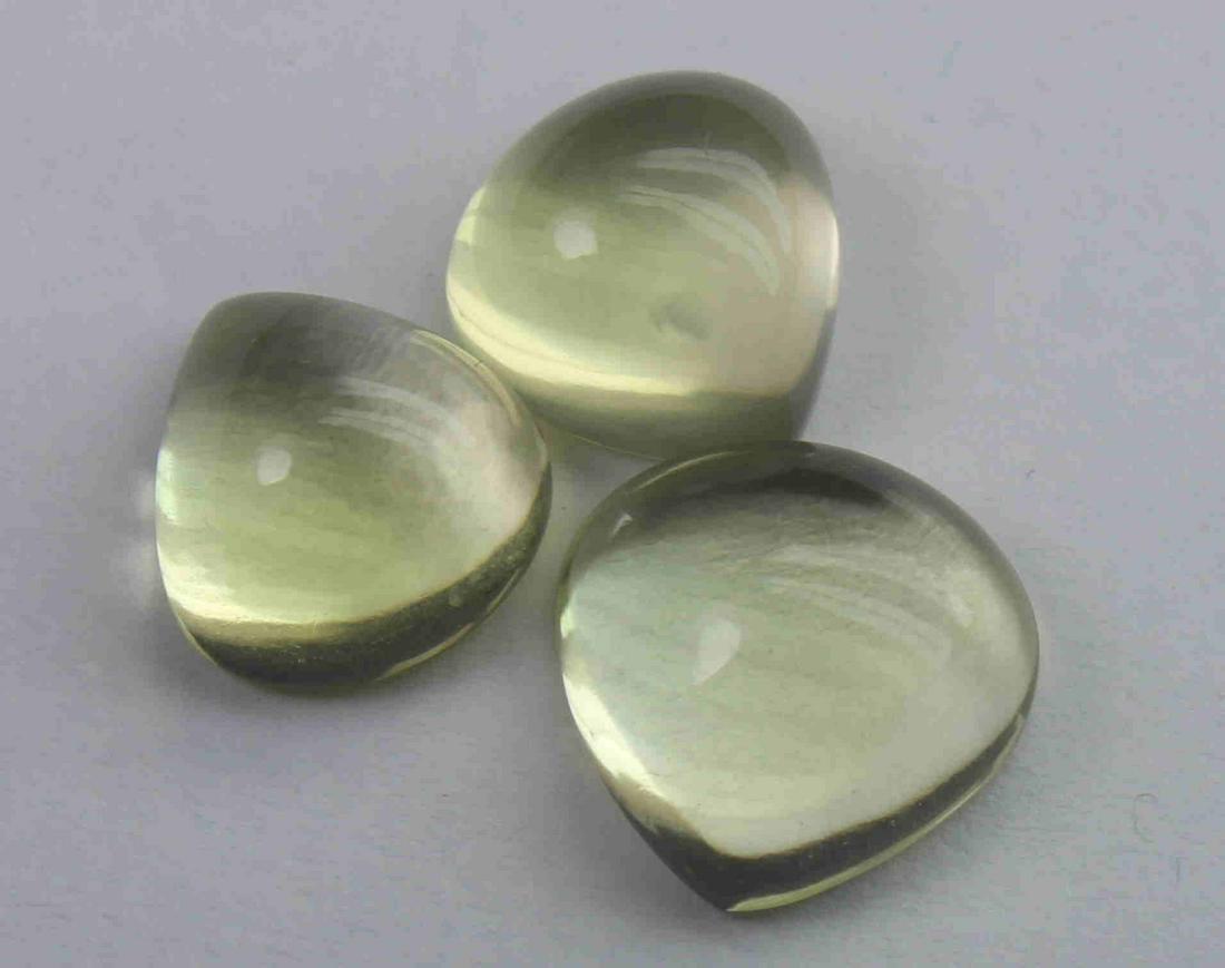 11.27 Ct Natural Lemon Quartz Lot: No Reserve! Gemstone : Natural Lemon QuartzWeight : 11.27 CaratsDimensions : 11x11x5.4 mm , 9.5x9.5x5.5 mm , 9.7x9.3x5.5 mmShape : Pear CabochonNumber of Stone : 3Colour : Greenish Yellow Origin : Afr