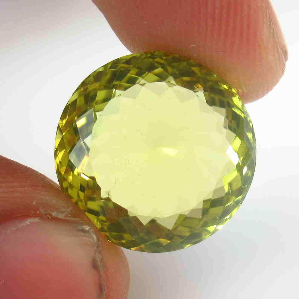 17.42 Ctw Natural Lemon Quartz Round Cut: No Reserve! Title: 17.42 Ctw Natural Lemon Quartz Round Cut Color/Clarity: VVS Gemstone:Lemon Quartz Carat Weight: 17.42 Size/Dimensions: 17.00 x 17.00 x 9.90 mm Additional Information: Good Luster / 