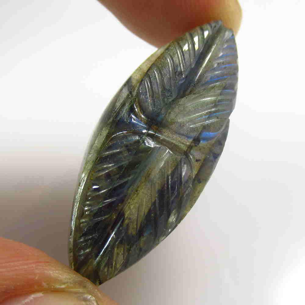 23.75 Ctw Natural Labradorite Carving: No Reserve! Title: 23.75 Ctw Natural Labradorite Carving Color/Clarity: Opaque Gemstone:Labradorite Carat Weight: 23.75 Size/Dimensions: 34.00 x 13.50 x 7.50 mm Additional Information: Nice Carving /