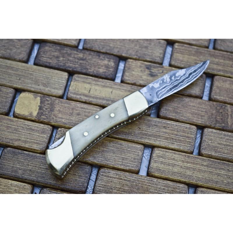 Hunting folding damascus steel knife pocket camel bone: Knife "Riandahy" made of damask steel. Handle – camel bone and scabbard - genuine leather. Damascus knives are very durable, look great and keep sharpness perfectly. Damascus steel has high quality 
