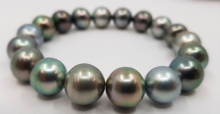 10x11.5mm Shimmering Tahitian Pearls Tahitiaanse parels: Title: 10x11.5mm Shimmering Tahitian Pearls Tahitiaanse parels - Armband Description: This beautiful pearl bracelet features a row of lustrous multi coloured Tahitian pearls measuring 10x11.5mm. Grown