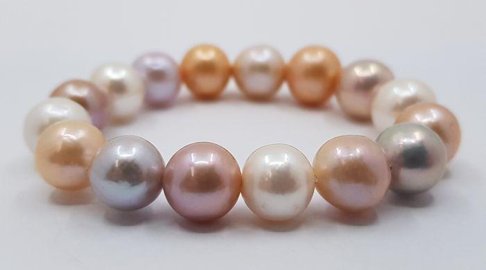 11x14mm Multi Edison Freshwater pearls - Bracelet: Title: 11x14mm Multi Edison Freshwater pearls - Bracelet Description: Most freshwater pearls are nucleated by tissue, but Edison cultured pearls are nucleated with beads, exactly as saltwater pearls T