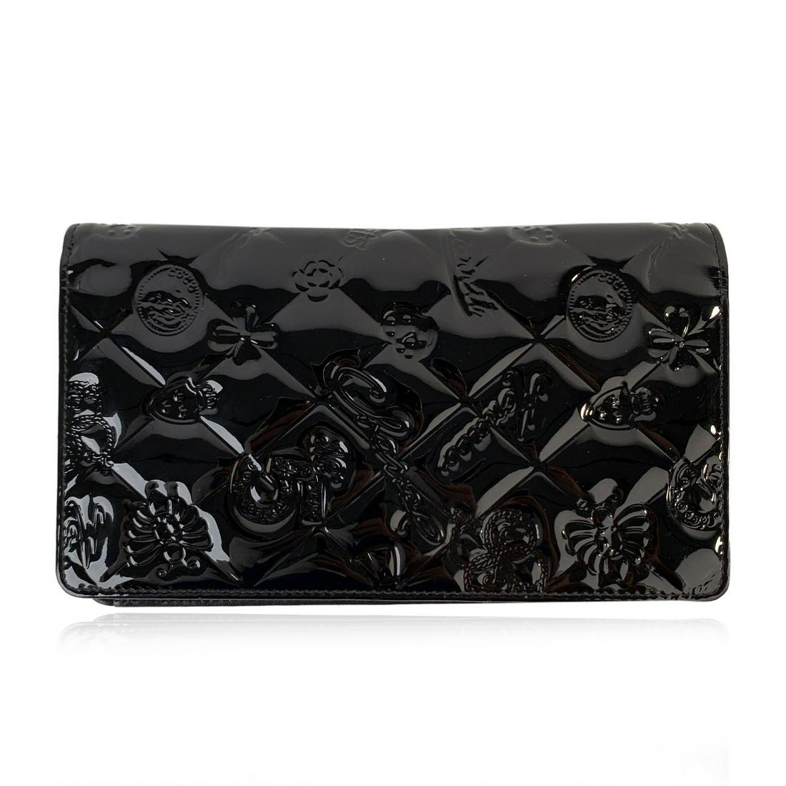 Chanel Black Quilted Patent Leather Icon Symbols Long: Chanel Icon Symbols Patent Leather Wallet in beautiful shiny black patent leather. Inside it is lined in smooth balck leather . This wallet has 8 card slots 4 other pockets and a 1 zip money pocket. '
