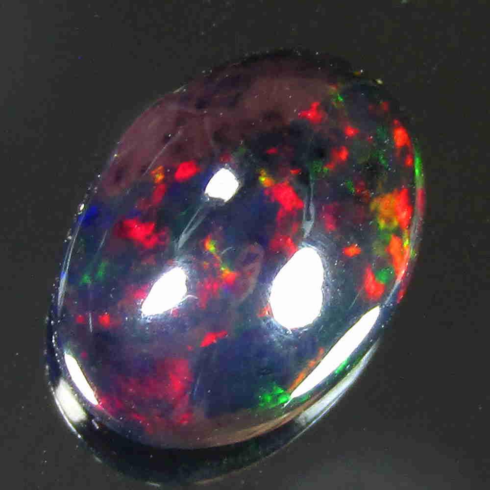 3.30Cts Natural Multi color Black Opal Oval Cabochon: Title: 3.30Cts Natural Multi color Black Opal Oval Cabochon Good Luster loose gemstone Carat Weights: 3.3 Size/Dimensions: 12.50x9.00x5.70 MM Additional Information: HEATED Reserve: $40.00 Shipping: D