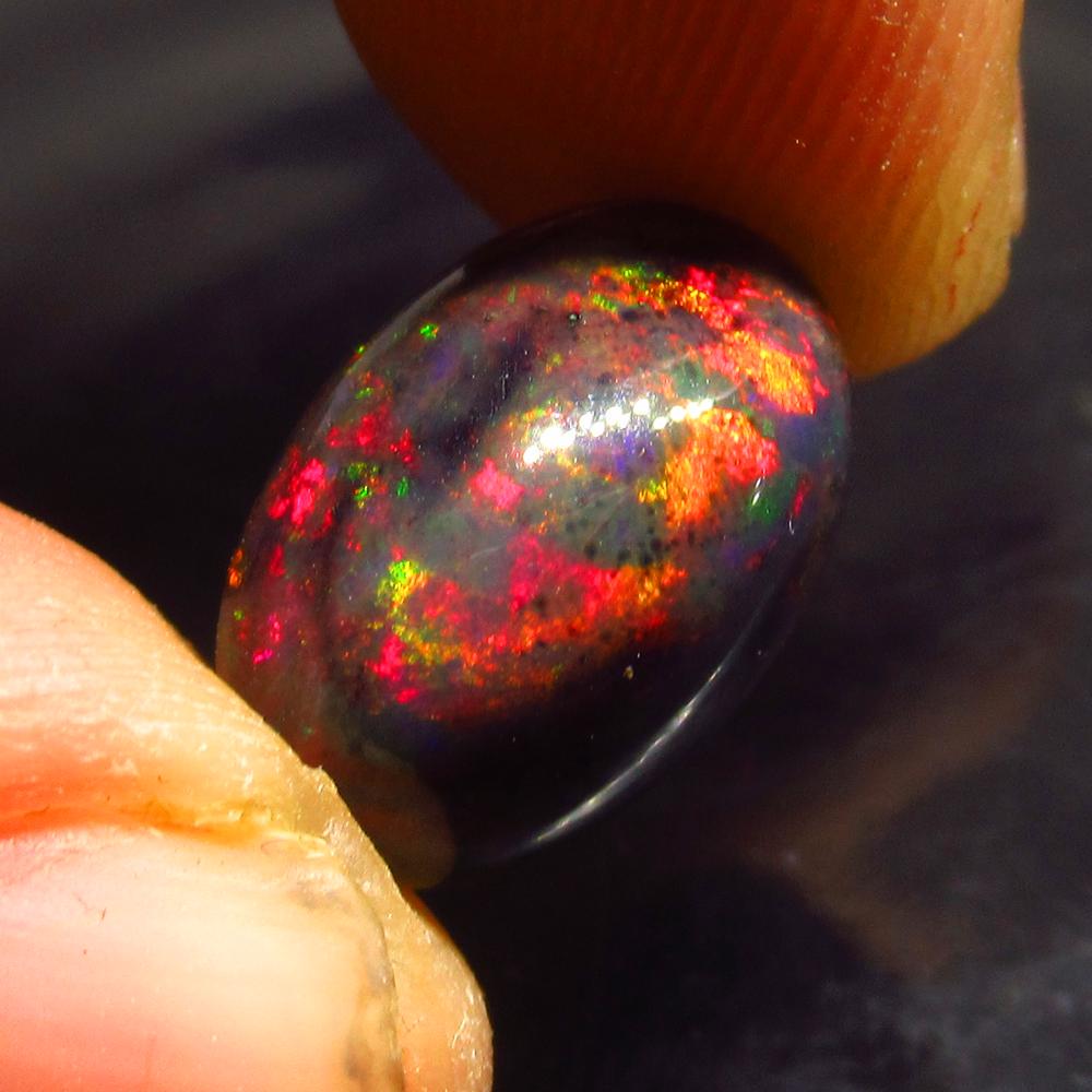 4.17 Ct Natural Ethiopian Black Fire Opal Oval Cab (1 of 4)