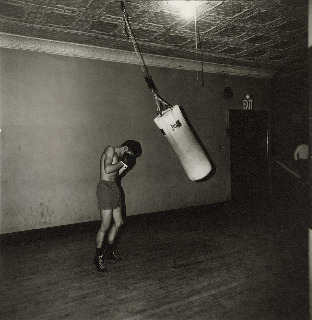 DIANE ARBUS - Boxer with a Punching Bag, NYC, 1964: Artist: Diane Arbus Title: Boxer with a Punching Bag, NYC, 1964 Medium: Photo Litho, 2003, Germany Dimensions: 8.05x8.25" Additional Information: Heat Wax Mounted on 11x14" Conservation Board Artist B