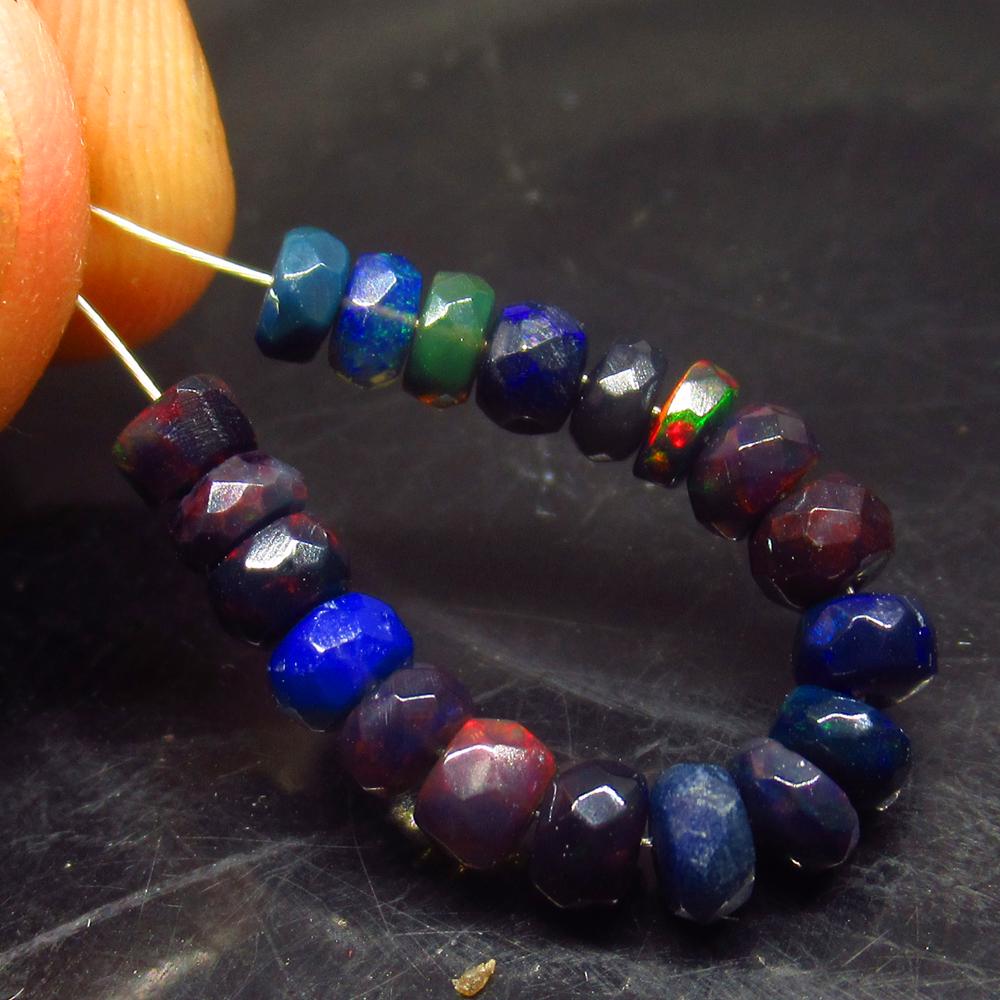 3.64 Ct Natural 19 Drilled Faceted Black Fire Opal: No Reserve! Title: 3.64 Ct Natural 19 Drilled Faceted Black Fire Opal Beads Stone Clarity: Translucent Gemstone: Natural Faceted Black Opal Beads Carat Weight: 3.64 Size/Dimensions: 3.70 to 4.00 mm / 