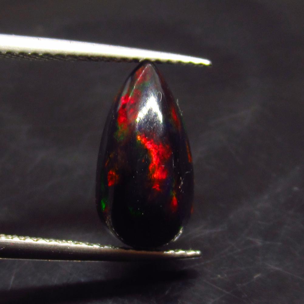 2.51 Ct Natural Ethiopian Black Fire Opal Pear Cab: No Reserve! Title: 2.51 Ct Natural Ethiopian Black Fire Opal Pear Cab Stone Clarity: Translucent Gemstone: Natural Black Opal Carat Weight: 2.51 Size/Dimensions: 14.50 x 7.50 x 6.50 mm Additional Info