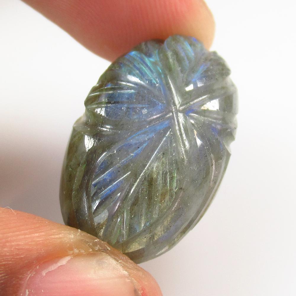 27.42 Ct Natural Labradorite Carving: No Reserve! Title: 27.42 Ct Natural Labradorite Carving Stone Clarity: Opaque Gemstone: Natural Labradorite Carat Weight: 27.42 Size/Dimensions: 27.00 x 15.80 x 8.00 mm Additional Information: Excelle