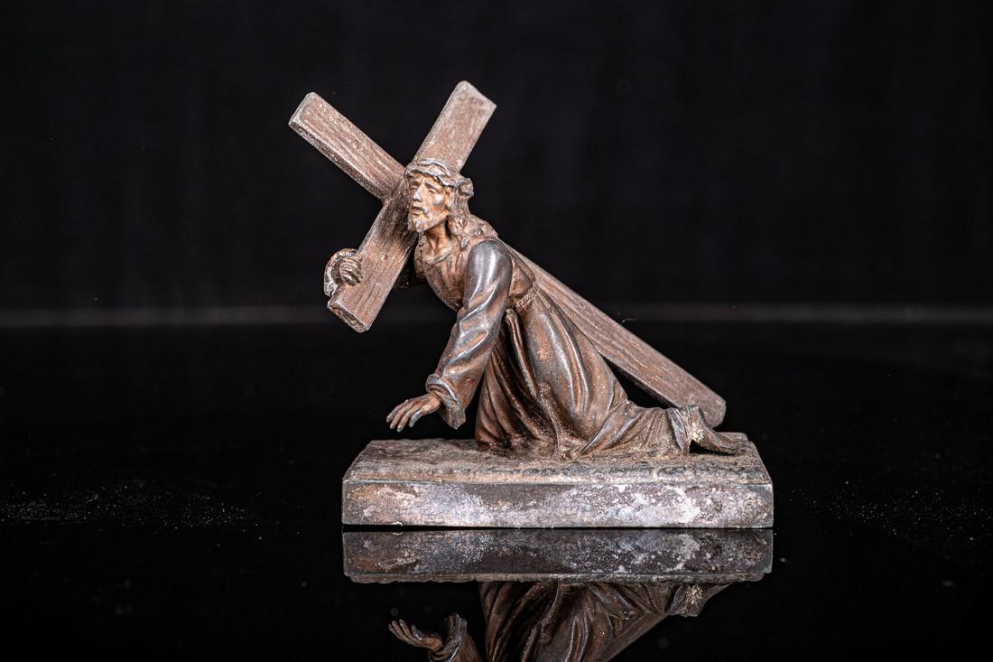 Small statue of christ with cross (1 of 1)