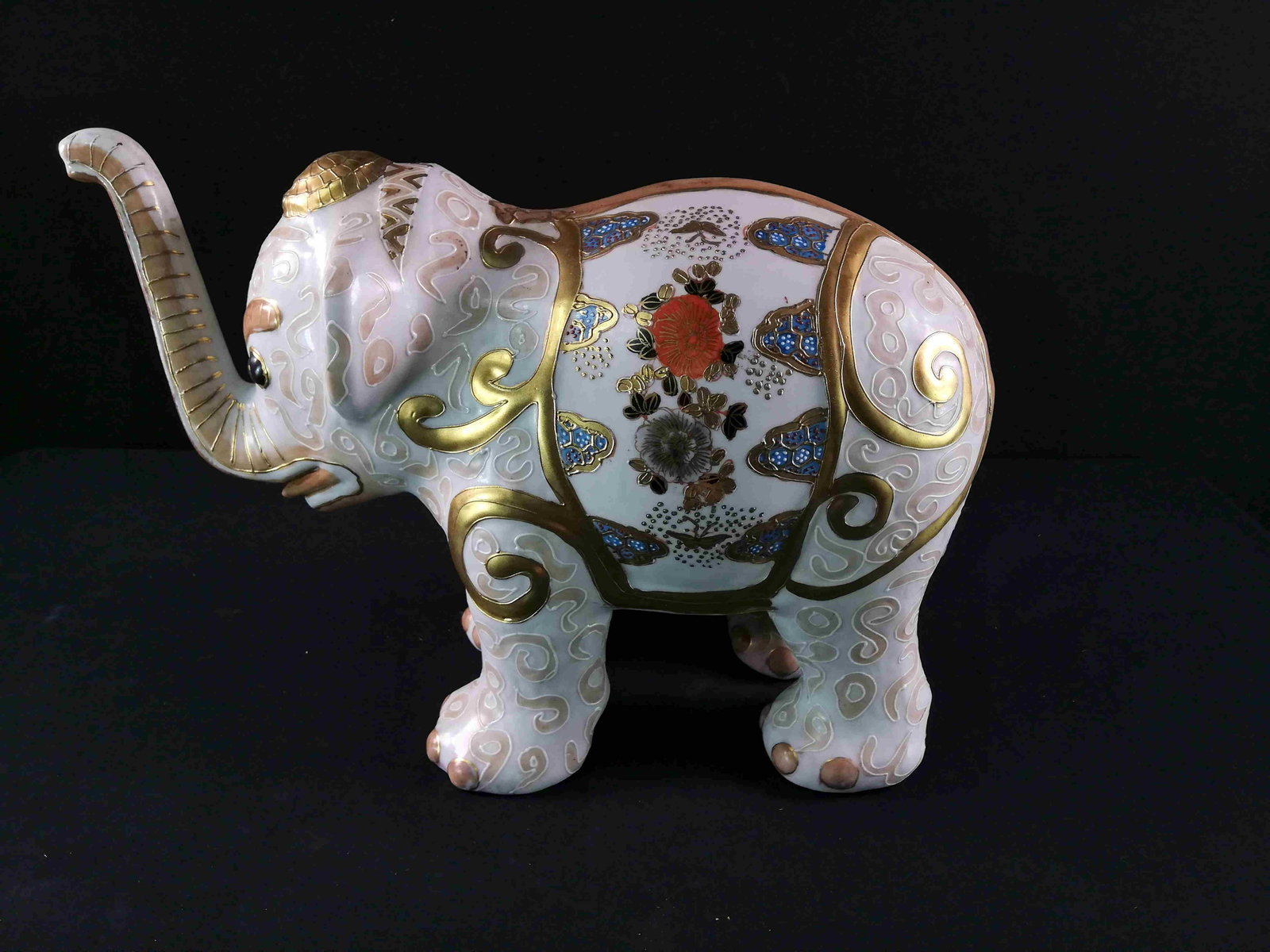 Vintage Chinese porcelain Elephant: Title: Vintage Chinese porcelain Elephant Maker: unknown, marked Origin: China Date/Period: Late 20th century Materials: Porcelain Dimensions:Height: 26 cm / 10.4 inchesWidth: 42 cm / 16.8 inches Desc