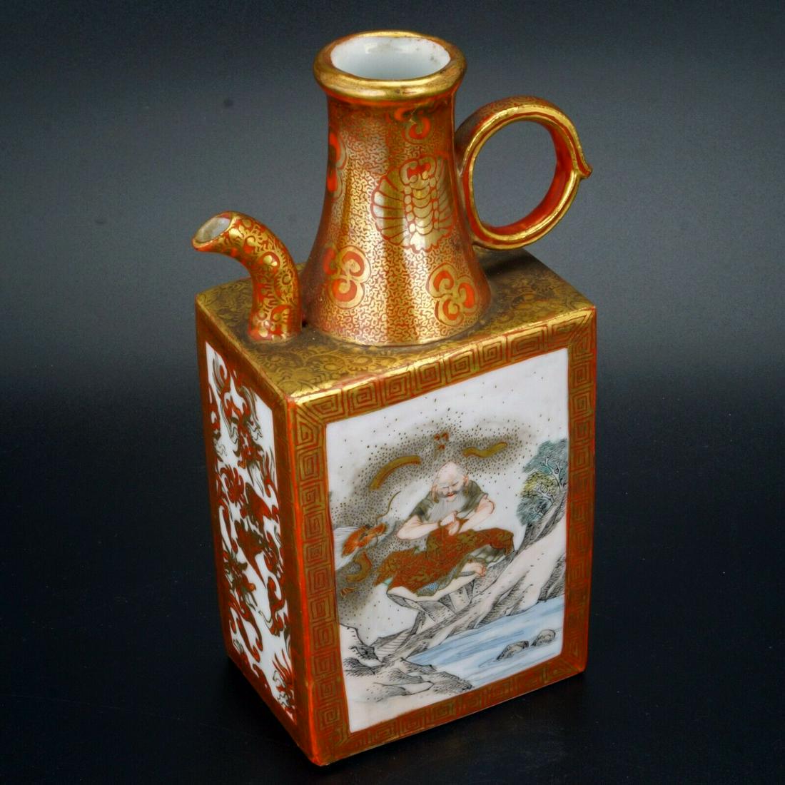 Japanese Meiji Kutani small serving pitcher: An incredibly detailed hand painted porcelain serving pitcher with tiny works of art on each side. The features on the figure and dragon are minute. The landscape panel is by a true artist. A tour de 