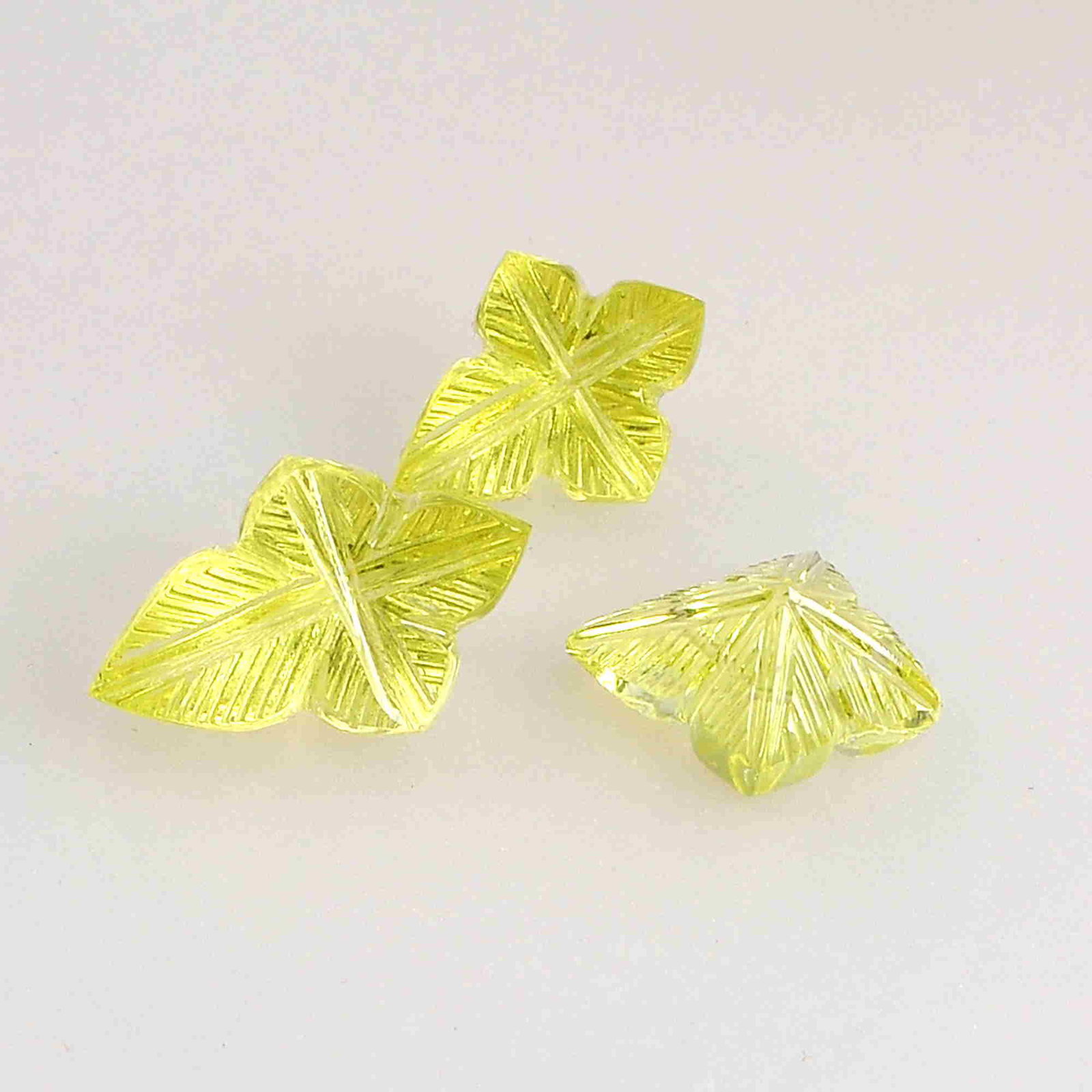 29.4 Carat Yellow Color Natural Fancy Lemon Quartz: Title: 29.4 Carat Yellow Color Natural Fancy Lemon Quartz Loose Gemstone 3 Pieces Brand: Gems Trading Center Gemstones: Lemon Quartz Carat Weights: 29.4 Size/Dimensions: 10H x 15W x 22L mm Reserve: $3