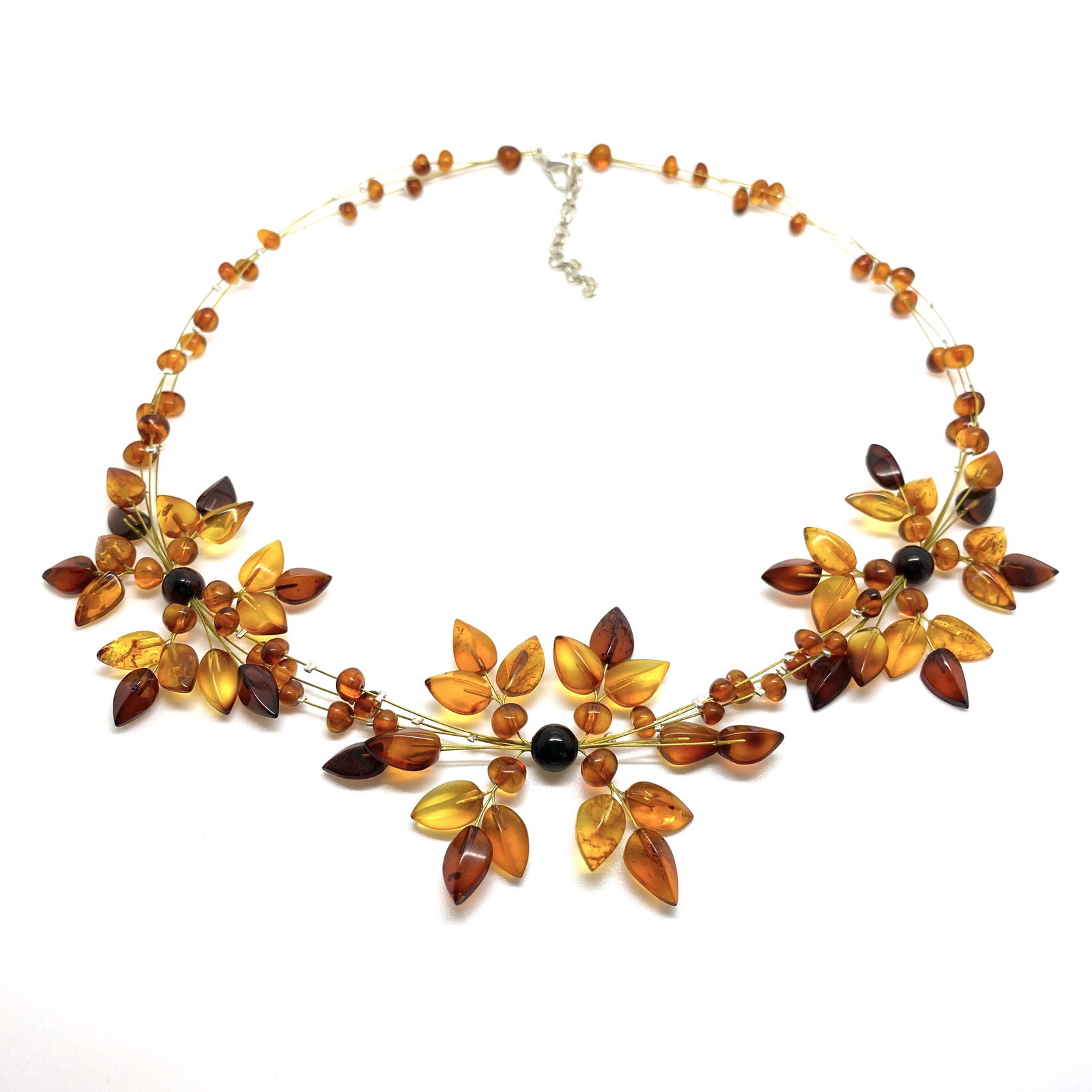 Amazing Amber Floral Necklace made from leaf like bead: Title: Amazing Amber Floral Necklace made from leaf like bead ornaments Metal: None Gemstones: Amber Weight: 13.0 g Size: Size: 44.0 x 5.0 x 420.0 mm Size: 1.732 x 0.197 x 16.535 inches Made of:(Recon
