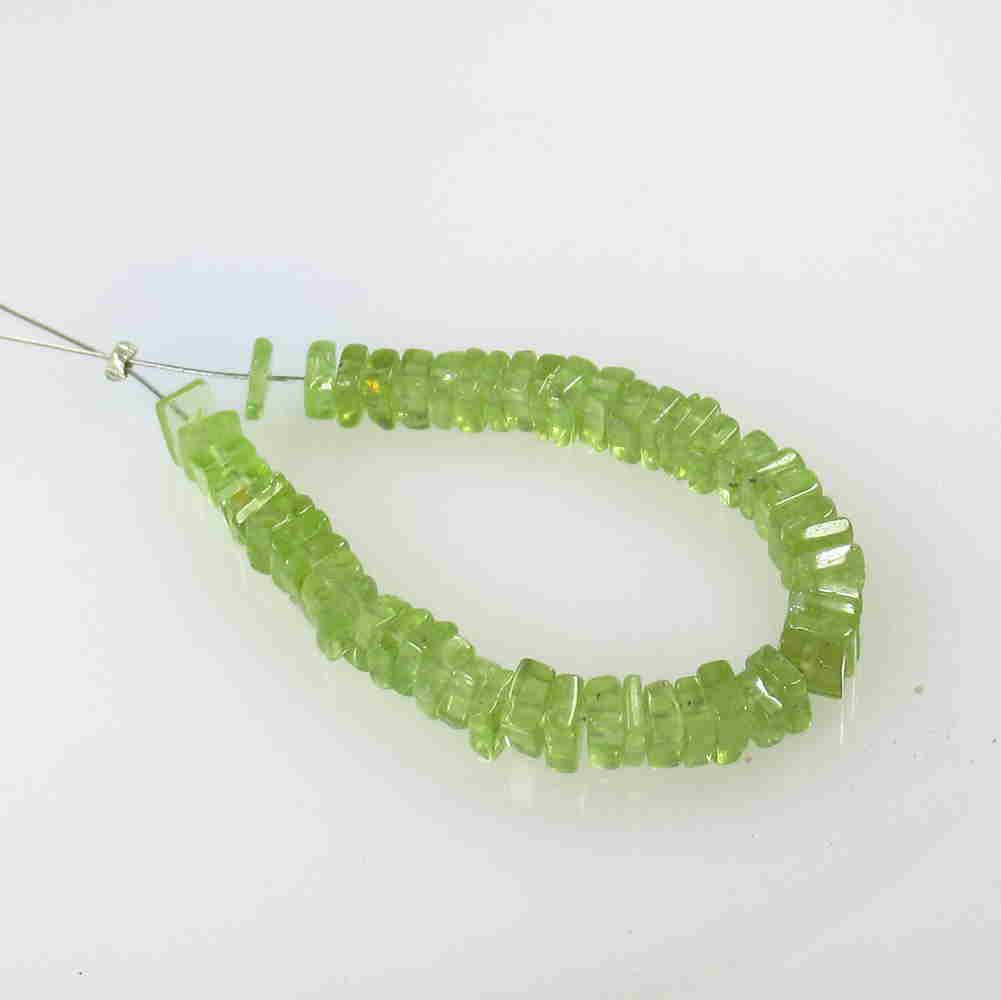 17.54 Ctw Natural 53 Drilled Round Peridot Square Beads: No Reserve! Title: 17.54 Ctw Natural 53 Drilled Round Peridot Square Beads Stone Clarity: Transparent Gemstones: Peridot Beads Size/Dimensions: 17.54 Carat Weights: 3.70 to 4.30 mm / 53 PC's Additiona