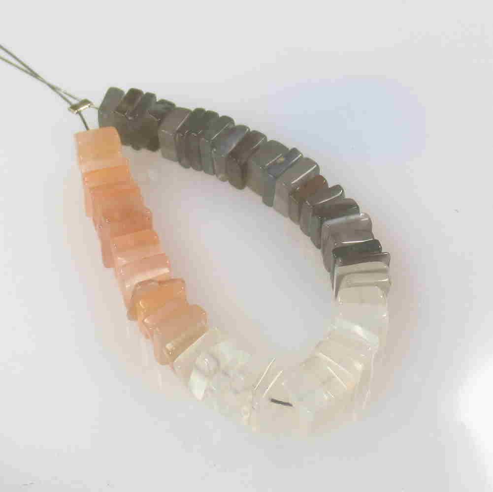 21.73 Ctw Natural 54 Drilled Moonstone Square Beads: No Reserve! Title: 21.73 Ctw Natural 54 Drilled Moonstone Square Beads Stone Clarity: Semi-Transparent Gemstones: Moonstone Beads Size/Dimensions: 21.73 Carat Weights: 4.6x4.6 - 5.3x5.3 mm / 54 PC's A