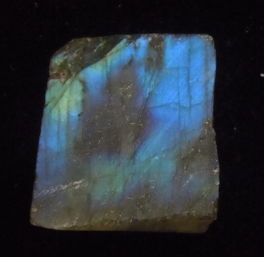 7.71 GRAM IRIDESCENT LABRADORITE: Title: 7.71 GRAM IRIDESCENT LABRADORITE Origin: Ampahnihy, Atsimo Andrefana, Madagascar Size: 2.5x2x0.6 cm / 7.71 gram iridenscent, multicolor and translucent labradorite Reserve: $2.00 Shipping: Dome