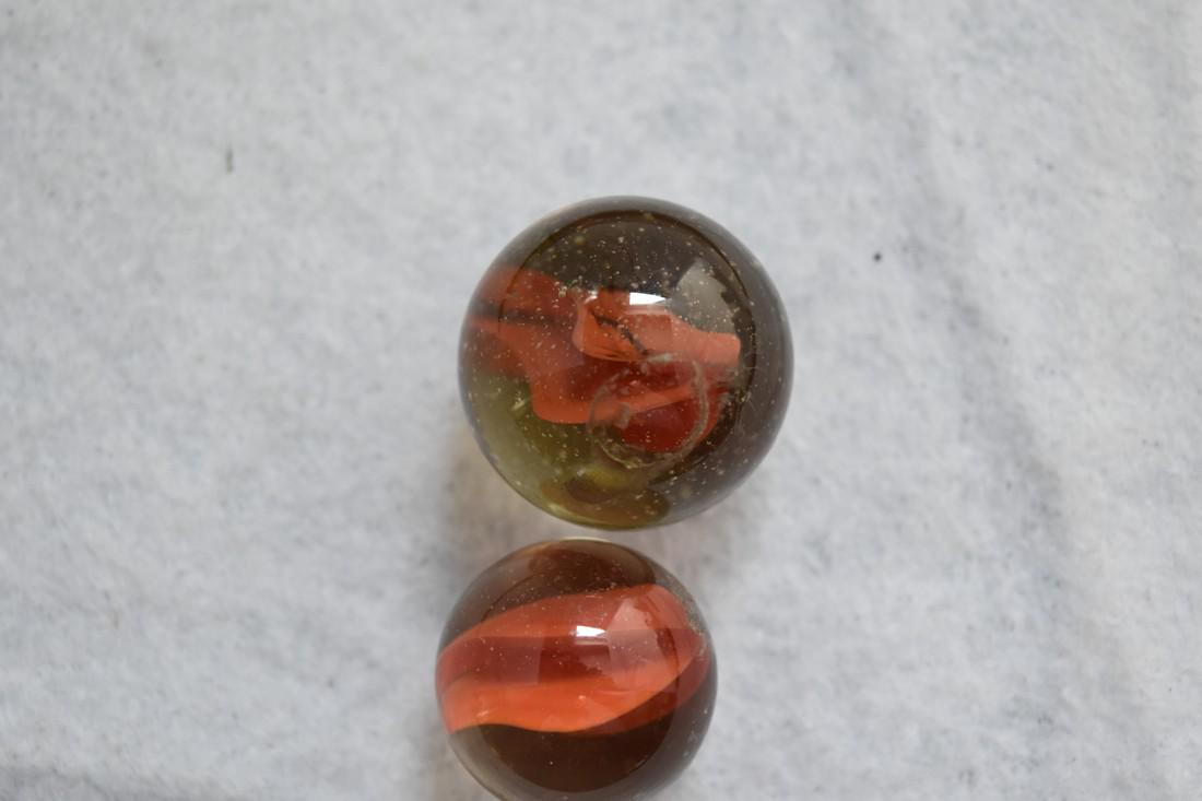 Lot of 2 Vintage Glass Marble Shooters: Lot of 2 Vintage Glass Marble Shooters Reserve: $5.00 Shipping: Domestic: Flat-rate of $10.00 to anywhere within the contiguous U.S. International: Foreign shipping rates are determined by destination
