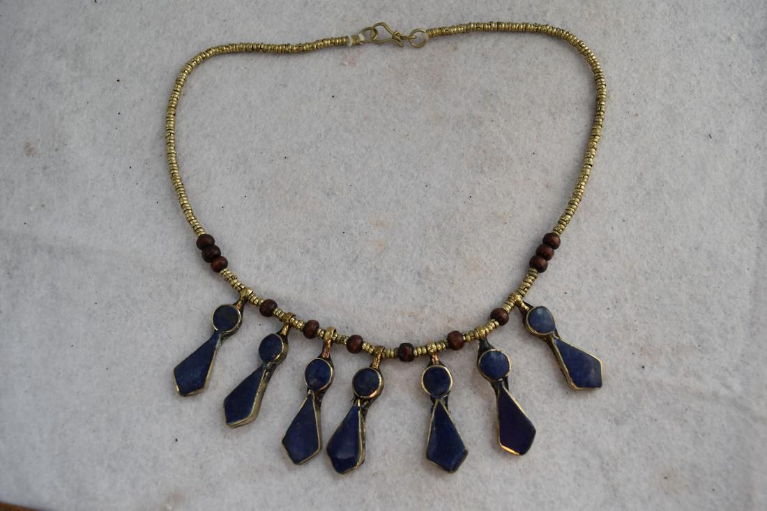 Lapis Lazuli Inlaid Ornate Necklace, Afghanistan: Lapis Lazuli Inlaid Ornate Necklace, Afghanistan Reserve: $5.00 Shipping: Domestic: Flat-rate of $10.00 to anywhere within the contiguous U.S. International: Foreign shipping rates are determined by d
