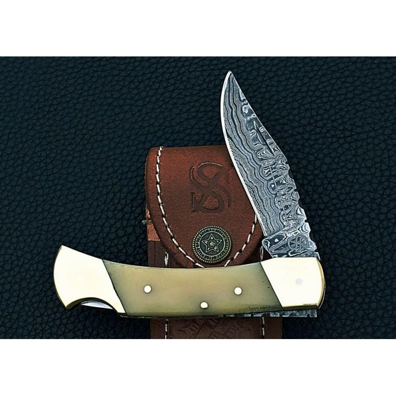 Folding hiking hunting damascus steel knife bone brass: Knife "Moon" Blade - damask steel Handle – bone, brass Scabbard – leather (included) Blade hardness – 58-60 HRC Total length – 178 mm. Blade length - 76 mm. Handle length – 102 mm. Blade But