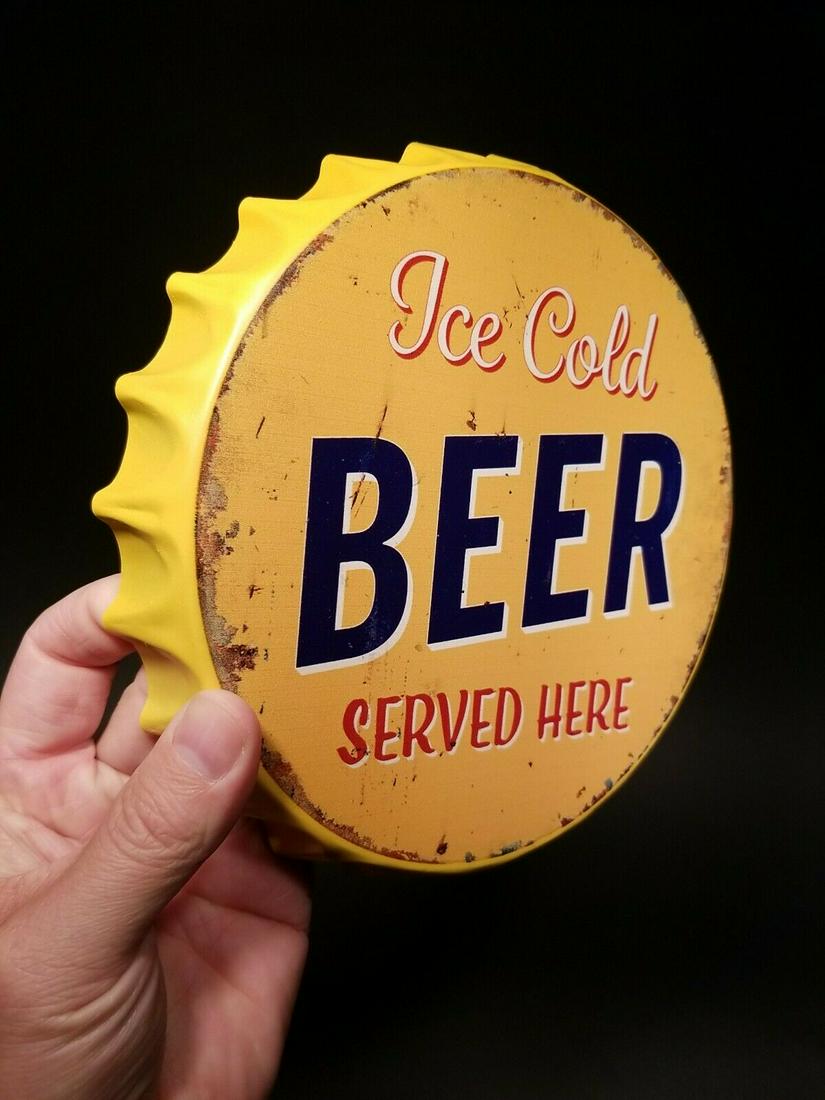 "Ice Cold Beer Served Here" Bottle Cap Shape Sign: 8" x 1" Such a neat Vintage Style "Ice Cold Beer Served Here" Bottle Cap Shape Sign. Great decorative piece. Reserve: [$15.00 Shipping: Domestic: Flat-rate of $8.00 to anywhere within the contiguous U