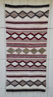 Navajo Woven Double Saddle Blanket Ca 1940s: Title: Navajo woven double saddle blanket ca 1940sProvenance/Additional Info: Bands of diamonds in differing patterns on a natural white wool field. Excellent condtion with good ends, corners and