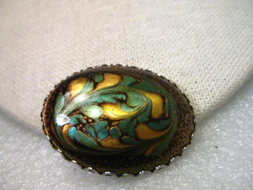 Vintage Swirled Art Glass in Sage, Gold, Chocolate Art: Vintage Oval Swirled Art Glass in a sage colored fern-like design with gold and then framed in almost a leopard chocolate and gold spotted like border. The colors are so silky and satiny looking. It i