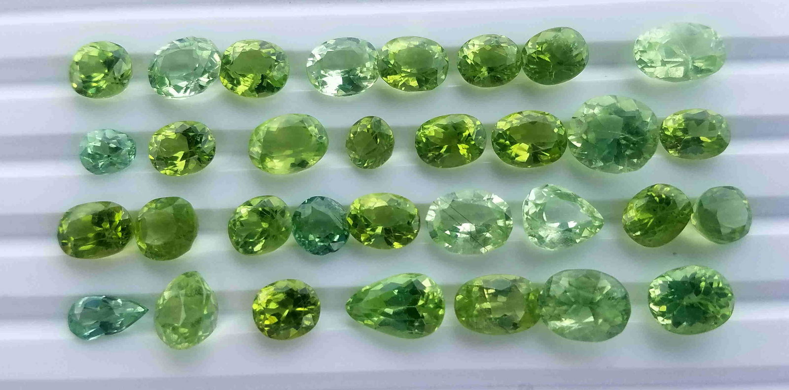 40 Carats Beautiful Peridot Gemstone Lot 32 Pieces: Title: 40 Carats Beautiful Peridot Gemstone Lot 32 Pieces Origin: Pakistan Gemstones: Peridot Carat Weights: 40 Carats Size/Dimensions: 32 Pieces Additional Information: Natural Reserve: $70.00 Shippi