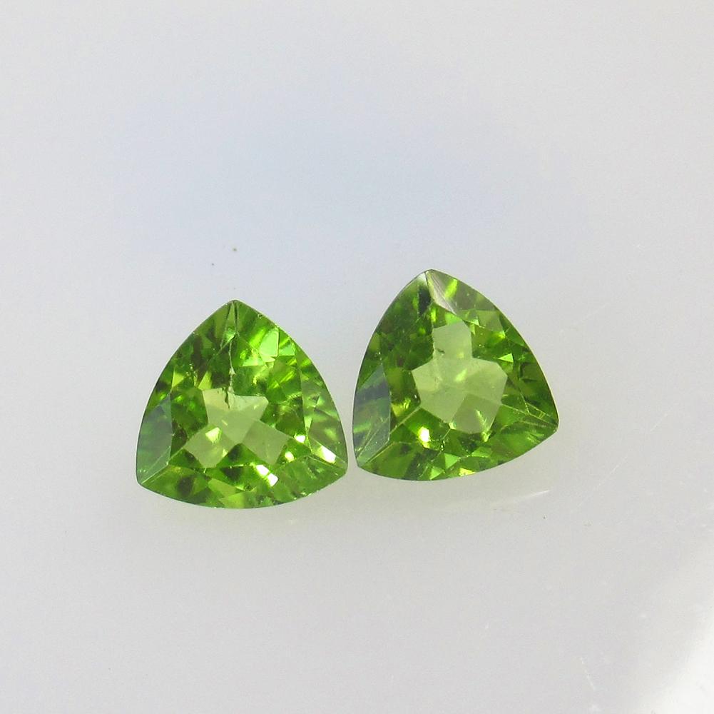 2.33 Ct Natural Pakistan Peridot Trillion Pair: Title: 2.33 Ct Natural Pakistan Peridot Trillion Pair Stone Clarity: VVS Gemstones: Natural Peridot Carat Weights: 2.33 Size/Dimensions: 6.90 x 6.80 x 3.70 mm / 2 PC's Additional Information: Top Clas
