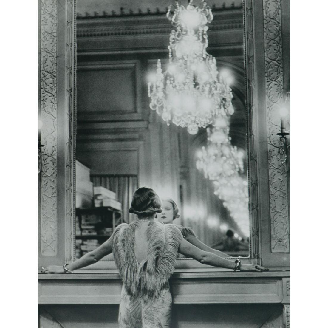 ALFRED EISENSTAEDT - A model in the atelier of Molyneux: Artist: ALFRED EISENSTAEDT Print Title: A model in the atelier of Molyneux in Paris, 1934 Medium: Sheet-fed Gravure Printing Date: 1960's Printed in Switzerland Image Size approx: 12.25 x 9.5 inches A