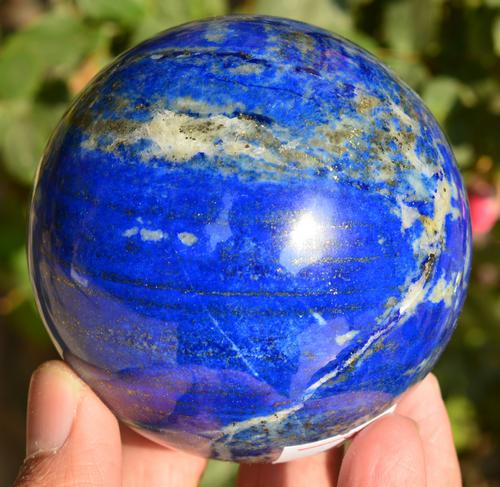 710 Grams Top Quality Lapis Lazuli Sphere wit Pyrite: Title: 710 Grams Top Quality Lapis Lazuli Sphere wit Pyrite Weight: 710 Grams Origin: Afghanistan Materials: Sphere Size: 76 MM Description: Treatment:Natural Reserve: $150.00 Shipping: Domestic: Flat