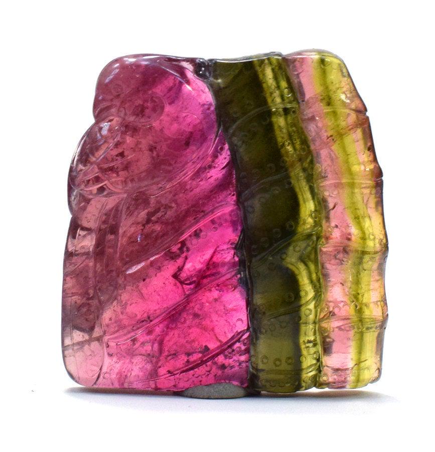 Tourmaline Carving , Multicolor Tourmaline Carved Slice: Tourmaline Carving , Multicolor Tourmaline Carved Slice , Tourmaline Jewelry. Weight : 101 cts Size : 37*35*07 mm Treatment : Natural Origin : paproke afghanistan DHL Express shipping M1-395 Reserve: 