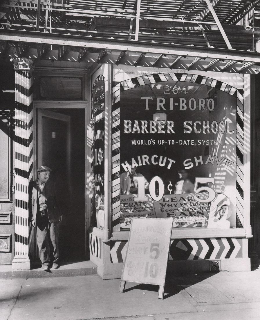 BERENICE ABBOTT- Tri-Boro Barber School, 264 Bowery: Artist: BERENICE ABBOT Print Title: Tri-Boro Barber School, 264 Bowery Medium: Photo-lithograph Printed in: Japan, 1980’s Image Size: approx. 10 x 8.5” Berenice Abbott (1898 – 1991),was an Ameri