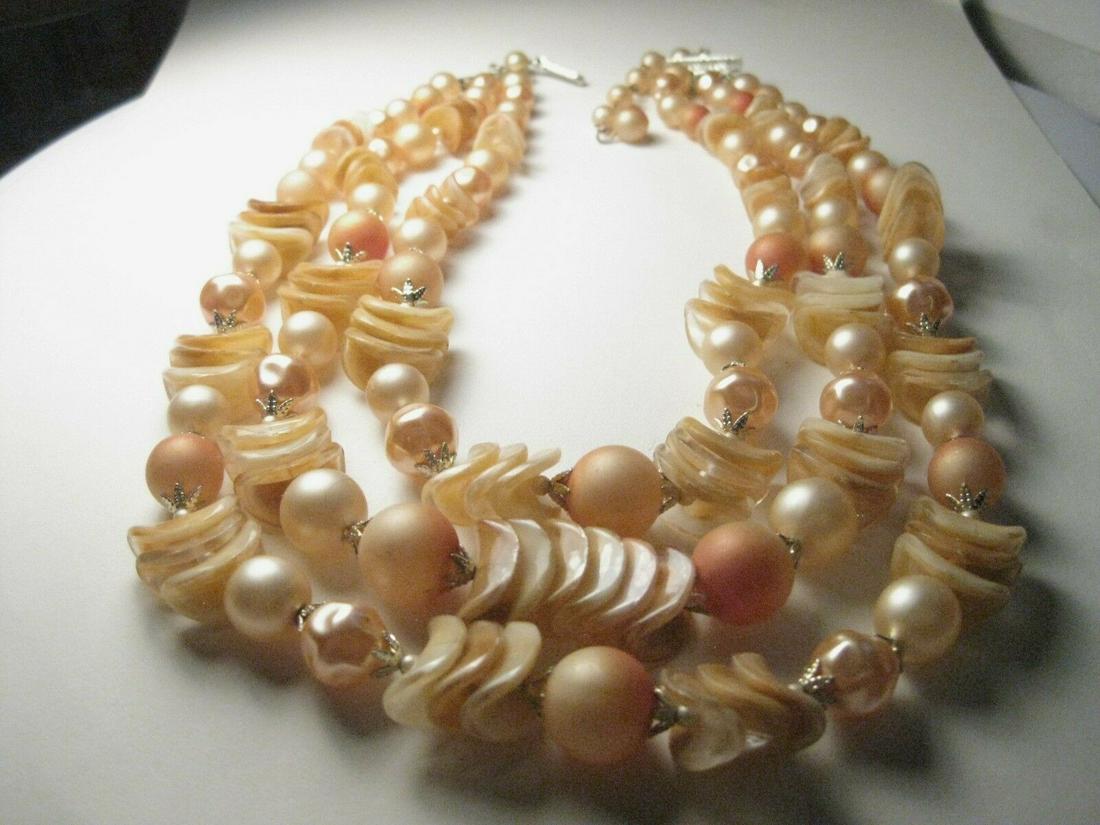 Vintage 1940's Triple Stand Peach Multi-Bead Styles,: Vintage 1940's triple strand choker, draping strands - peach with clear and creamy shades too - It has frosted peach beads with silvertone caps and also pearlized baroque type faux pearls also in a sh