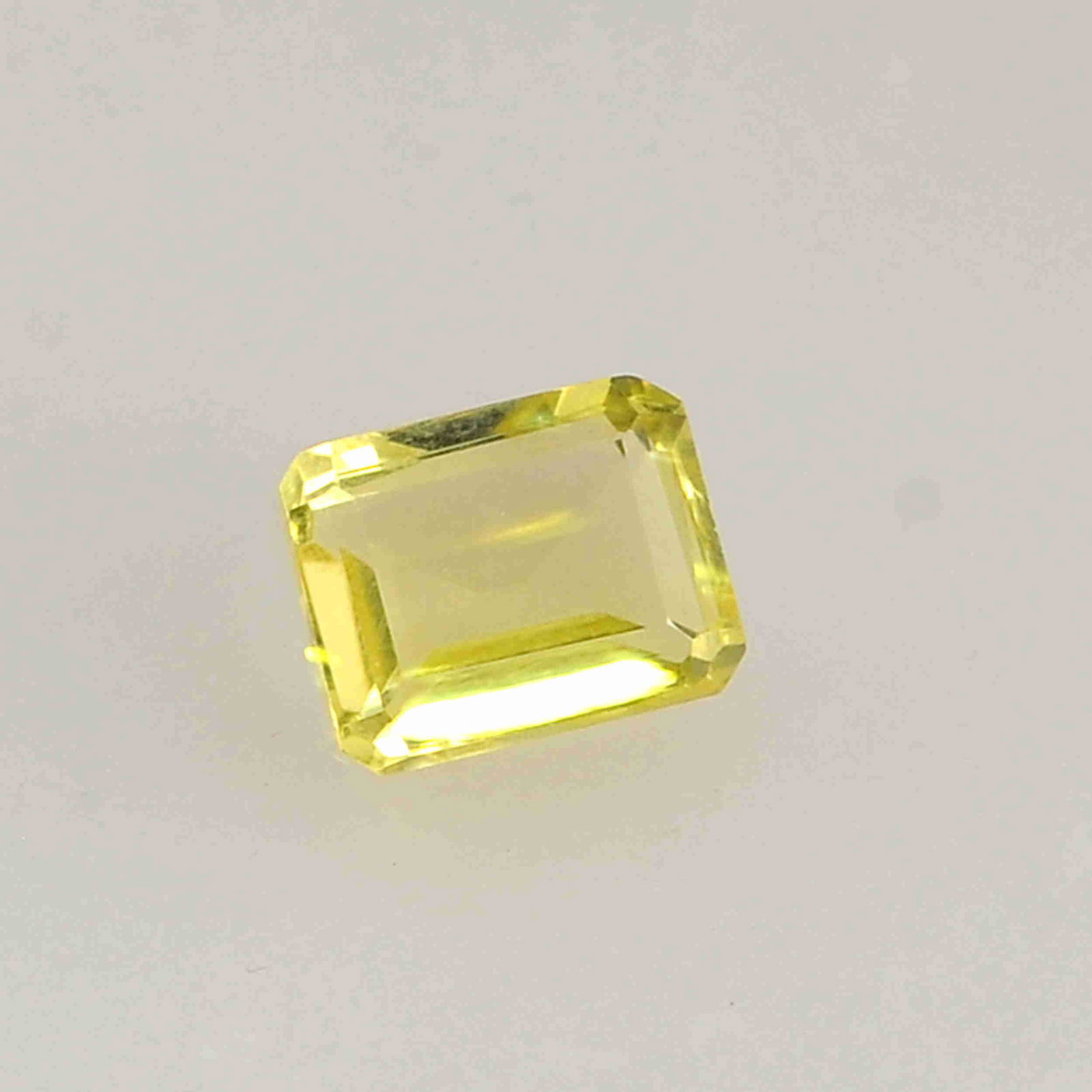 3.5 Carat Yellow Color Natural Octagon Lemon Quartz: No Reserve! Title: 3.5 Carat Yellow Color Natural Octagon Lemon Quartz Loose Gemstone 1 Pieces Gemstones: Lemon Quartz Carat Weights: 3.5 Size/Dimensions: 5.5H x 10L x 8W mm Shipping: Domestic: Flat-r
