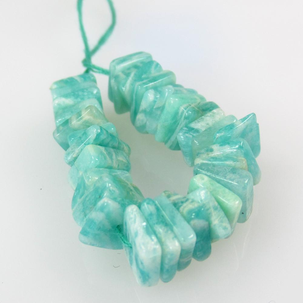 19.41 Ct Natural 30 Drilled Amazonite Square Beads: No Reserve! Title: 19.41 Ct Natural 30 Drilled Amazonite Square Beads Stone Clarity: Transparent Gemstones: Natural Amazonite Beads Carat Weights: 19.41 Size/Dimensions: 5.7x5.7 to 6.1x6.1 mm / 30 PC'
