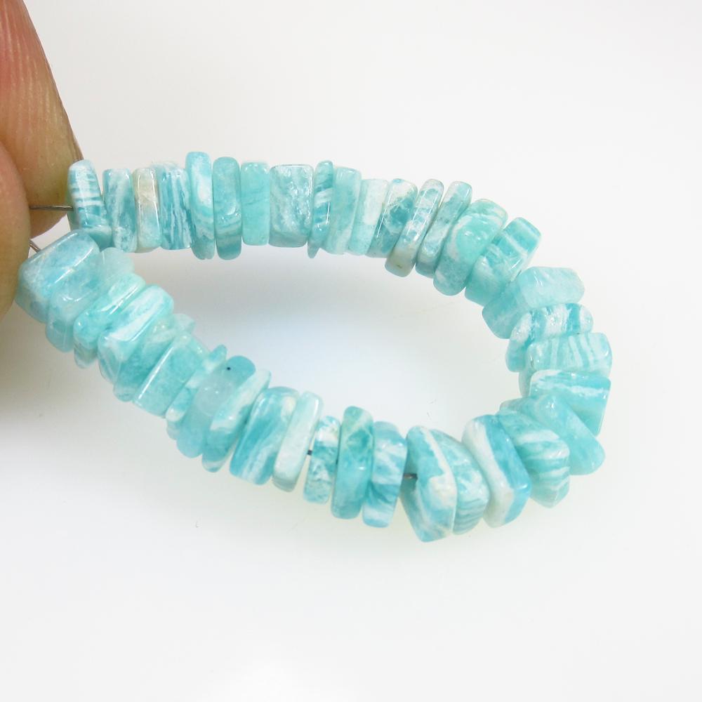 20.46 Ct Natural 39 Drilled Amazonite Square Beads: No Reserve! Title: 20.46 Ct Natural 39 Drilled Amazonite Square Beads Stone Clarity: Transparent Gemstones: Natural Amazonite Beads Carat Weights: 20.46 Size/Dimensions: 4.5x4.5 to 5.5x5.5 mm / 39 PC'